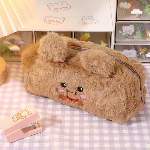 brown animal eating watermelon pencil case