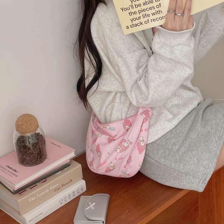 My melody crossbody uniqlo cross body handbag